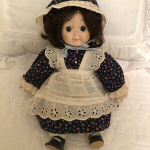 12" musical doll with China head, hands, and feet